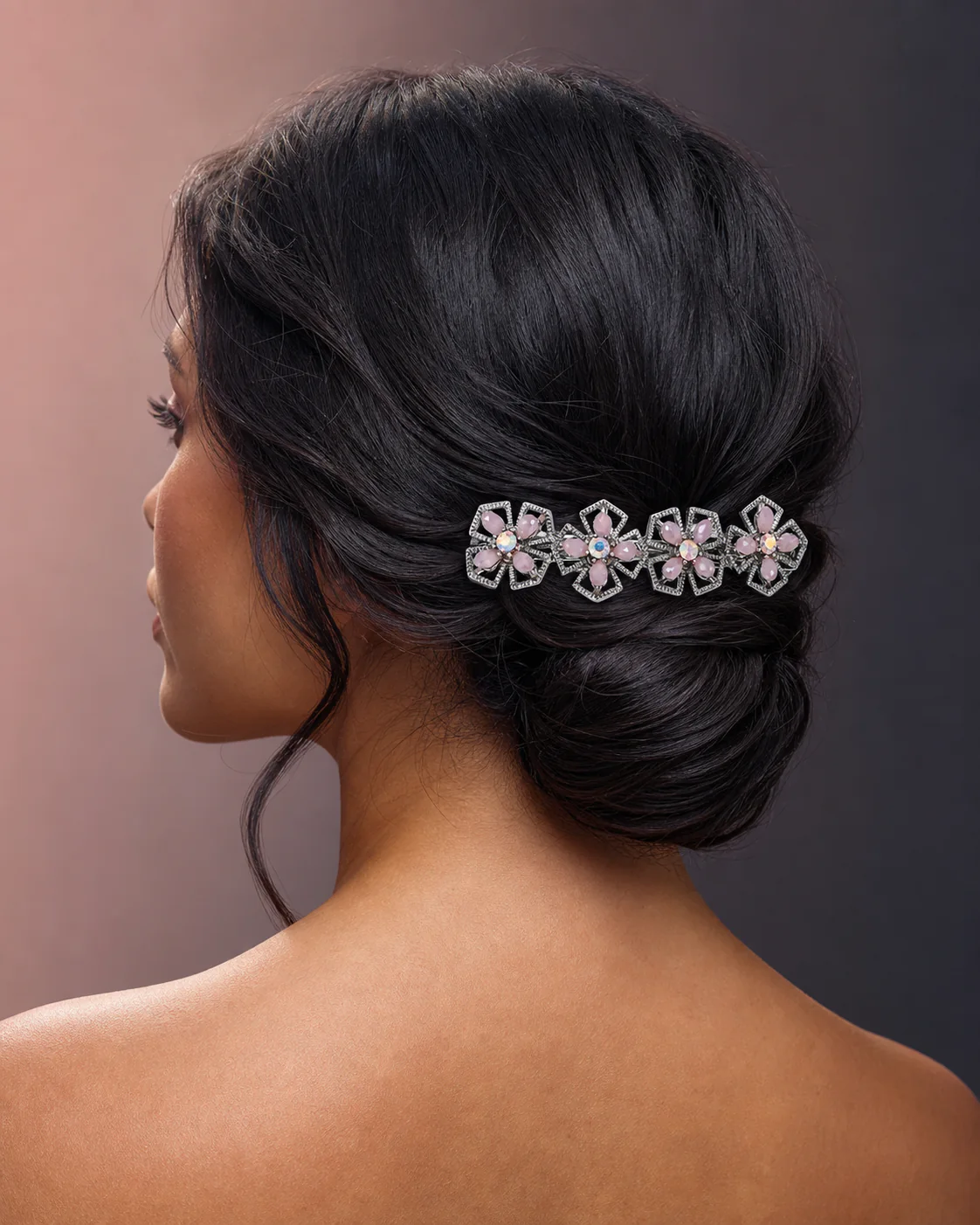 Editorial hairstyle featuring a blush crystal floral barrette